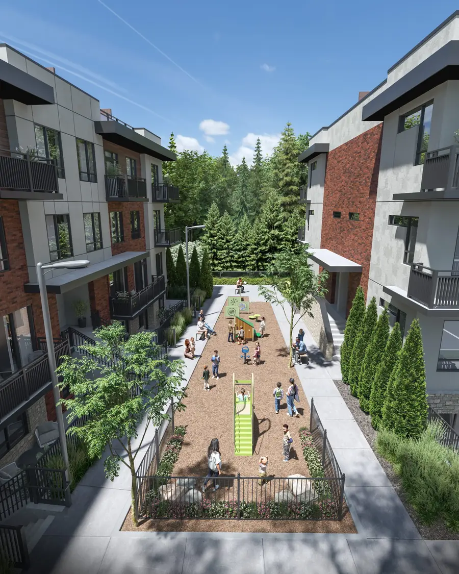 Landscaped tot lot courtyard between Blocks 7 and 8 at Spruce Trails